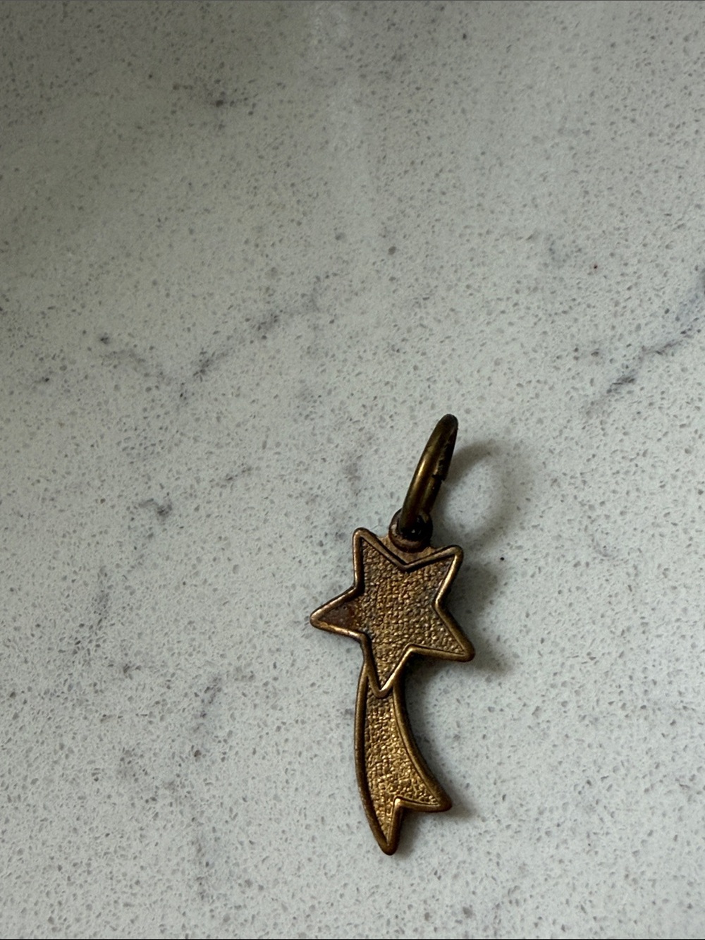 Shooting star brass charm